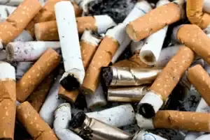 An infographic showing how smoking affects the lungs, heart, skin, and immune system over time.