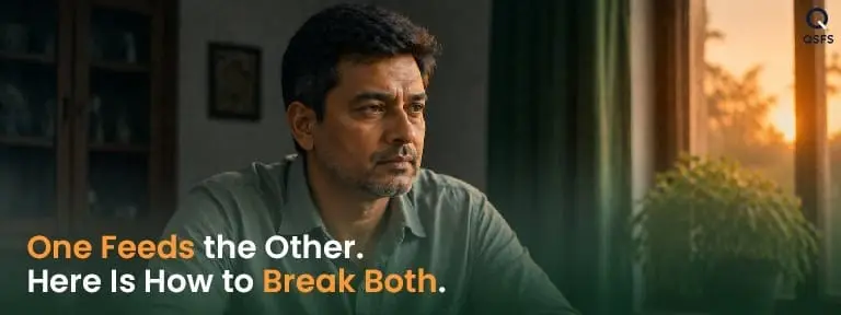 Indian man sitting with quiet determination at home — representing the decision to quit both smoking and drinking