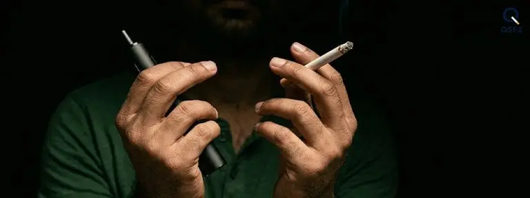 Two paths leading to the same place — representing that vaping and smoking both lead to the same nicotine addiction