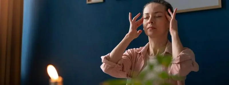 A smoker looking stressed despite smoking, highlighting the myth of nicotine as stress relief.