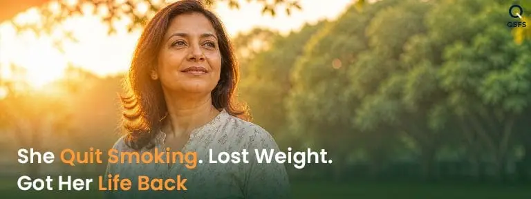 Indian woman standing confidently in golden morning light — representing health, vitality and weight loss after quitting smoking