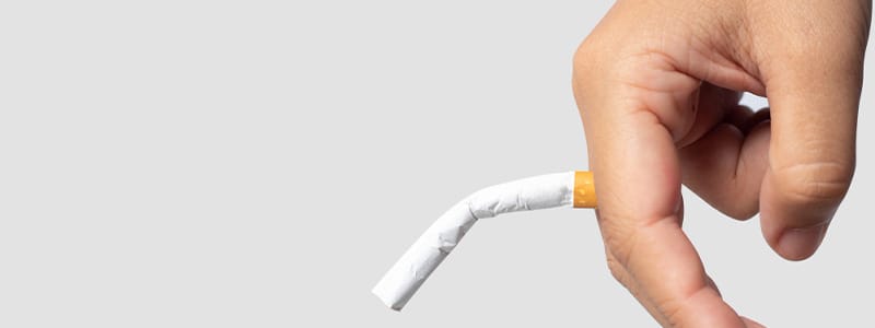 Illustration of cigarette smoke affecting blood circulation and sexual health